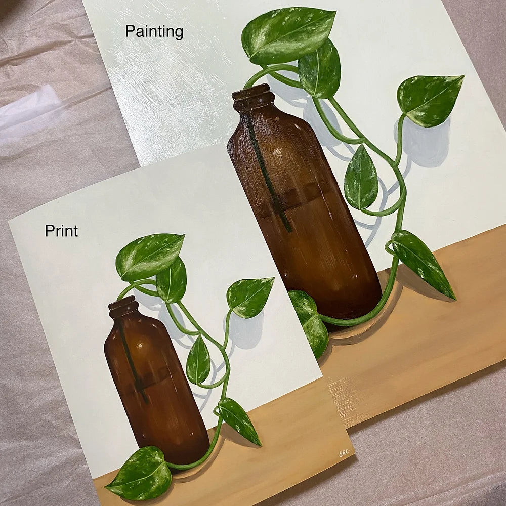 Devils Ivy in a Bottle on a Table Fine Art Print
